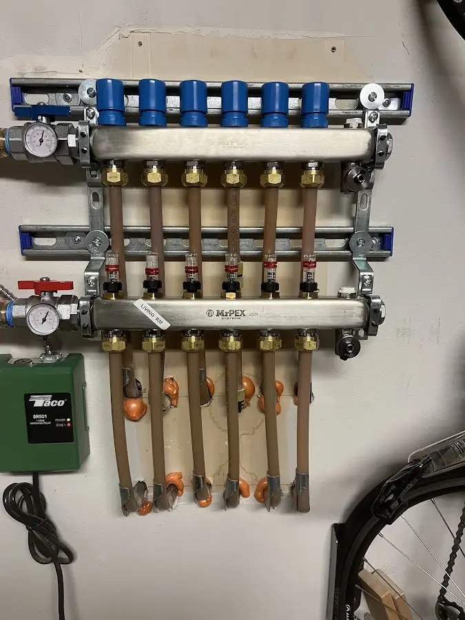 Plumber performing Water Heater Repair at a residential property in Camdenton